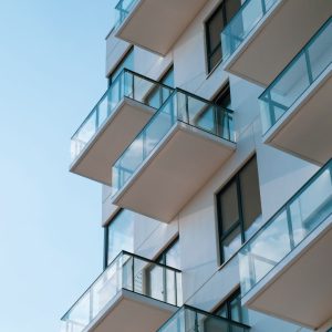 looking up at balconies of a small hotel used in a blog to explain online hotel booking software